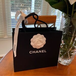 Chanel gift bag with Camellia flower and ribbon
AUTHENTIC AND NWT
